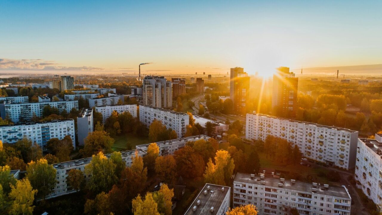 picture of building with sunset in the background